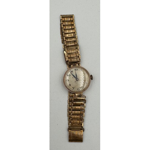 553 - A 1919 manual wind 15 jewel Rebberg movement Rolex Military trench watch, 9ct gold case on rolled go... 