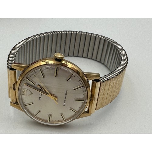 555 - A Tudor 9ct gold gentleman's wristwatch on rolled gold strap. Retirement watch S Powell 24. 8. 42. t... 