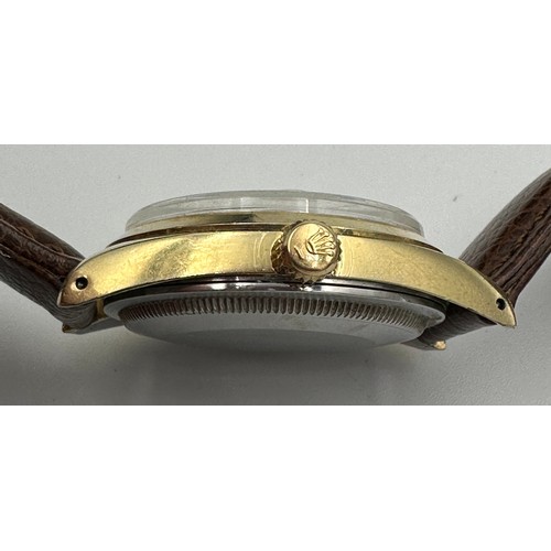 562 - A Rolex Oyster Perpetual Date wristwatch on gold plated case and brown leather strap. Case 34mm. Wit... 