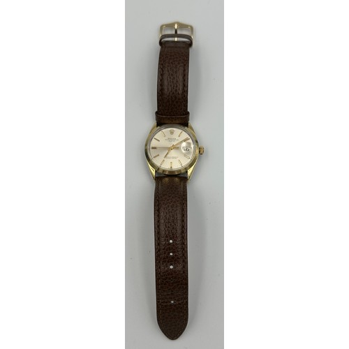 562 - A Rolex Oyster Perpetual Date wristwatch on gold plated case and brown leather strap. Case 34mm. Wit... 