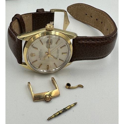 562 - A Rolex Oyster Perpetual Date wristwatch on gold plated case and brown leather strap. Case 34mm. Wit... 