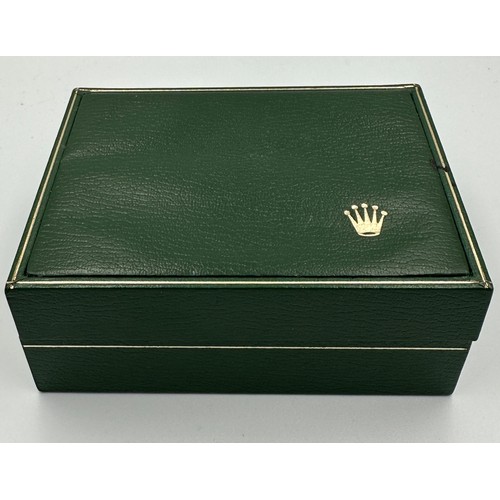 565 - A ladies stainless steel Rolex wristwatch on black leather strap and square case. In green Rolex box... 