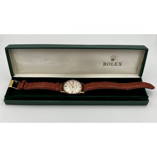 567 - A 1950's 9ct gold Rolex Precision hand winding wristwatch with subsidiary dial on brown leather stra... 