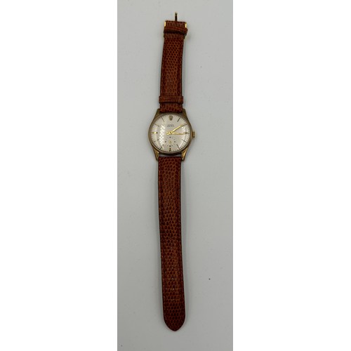 567 - A 1950's 9ct gold Rolex Precision hand winding wristwatch with subsidiary dial on brown leather stra... 