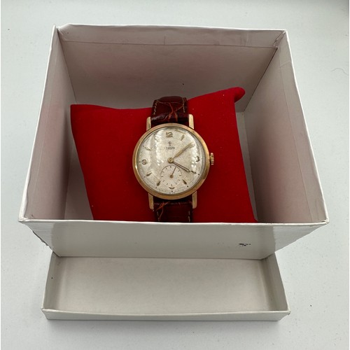 571 - A 1950's Tudor manual wind 9ct gold wristwatch with gold hands and numbers, subsidiary seconds dial ... 