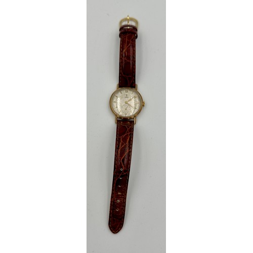 571 - A 1950's Tudor manual wind 9ct gold wristwatch with gold hands and numbers, subsidiary seconds dial ... 