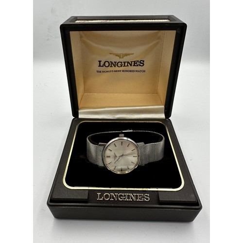 574 - A vintage gentleman's Longines wristwatch, stainless steel case on Longines stainless steel strap. S... 