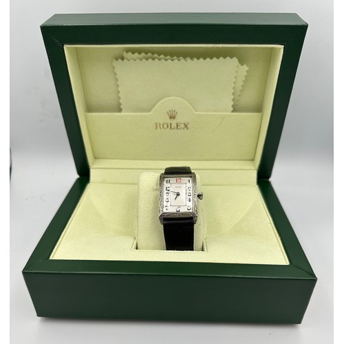 575 - A 1920's Rolex Rebberg rectangular gentleman's wristwatch with engraved bevel surround. With a green... 