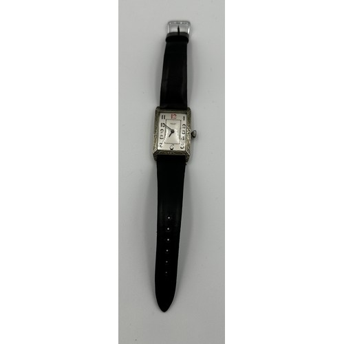 575 - A 1920's Rolex Rebberg rectangular gentleman's wristwatch with engraved bevel surround. With a green... 