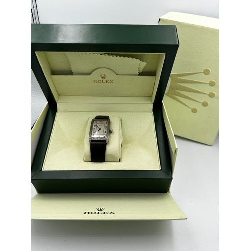 575 - A 1920's Rolex Rebberg rectangular gentleman's wristwatch with engraved bevel surround. With a green... 