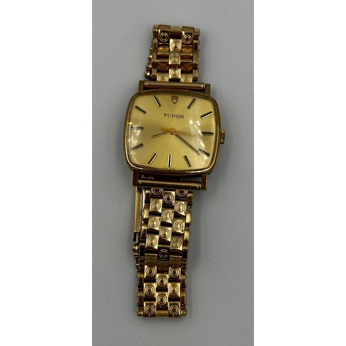 576 - A 1950's 9ct gold cased Rolex Tudor hand winding dress watch with gold plated bracelet. Rolex crown.... 