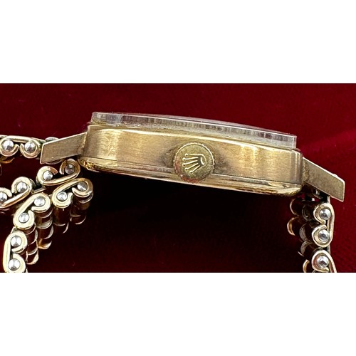 576 - A 1950's 9ct gold cased Rolex Tudor hand winding dress watch with gold plated bracelet. Rolex crown.... 