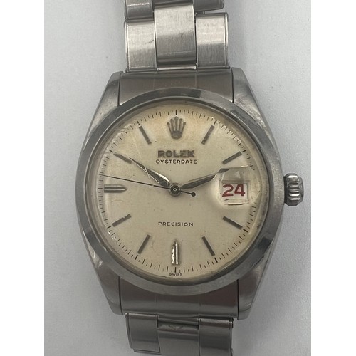 581 - A Rolex Oysterdate Precision stainless steel wristwatch, Serial No. 366249, Ref: 6494 Black and red ... 