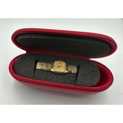 589 - An Omega Seamaster ladies quartz wristwatch. Case: 20mm. Engraved to back. In red omega zip case.

W... 