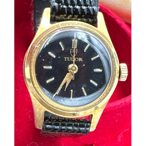 590 - A Tudor ladies wristwatch on black leather strap. Inner case stamped 403028. Outer stamped 1299. Cas... 