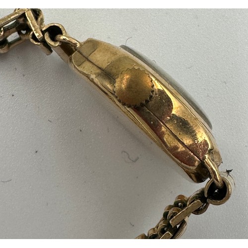 591 - A 9ct gold ladies Tudor wristwatch on rolled gold chain. Inner stamped 334025. B&S case made for Rol... 