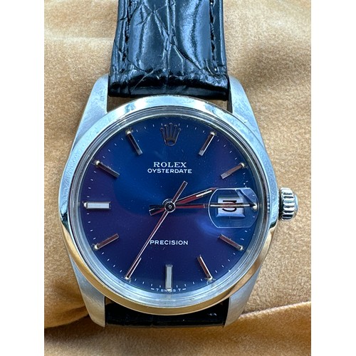 593 - A Rolex Oysterdate Precision stainless steel wristwatch with blue face, on black leather strap. Mode... 