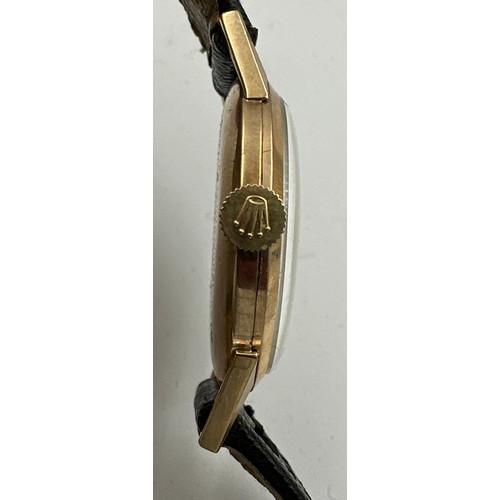 599 - A 9ct gold gentleman's presentation Tudor Royal wristwatch on black leather strap. Rolex crown, case... 