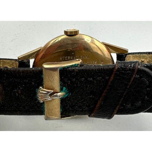 599 - A 9ct gold gentleman's presentation Tudor Royal wristwatch on black leather strap. Rolex crown, case... 