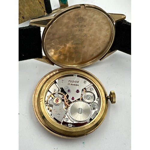 599 - A 9ct gold gentleman's presentation Tudor Royal wristwatch on black leather strap. Rolex crown, case... 