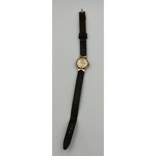 602 - A 9ct gold ladies Tudor Royal wristwatch on black leather strap. Case with full hallmarks. Inner sta... 