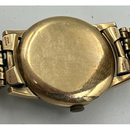 603 - A 9ct gold gentleman's Tudor Shock-Resisting wristwatch on rolled gold bracelet. Rolex case. Inside ... 