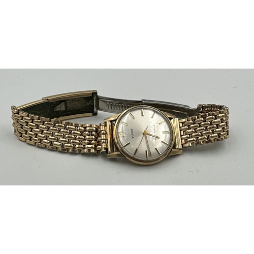 603 - A 9ct gold gentleman's Tudor Shock-Resisting wristwatch on rolled gold bracelet. Rolex case. Inside ... 