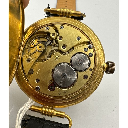 606 - A WW I Officers watch with Circular trench style hinged case with telephone dial. Case serial 533158... 