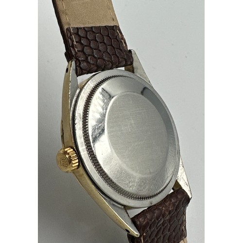 607 - A gentleman's Rolex Oyster Perpetual wristwatch, gold plated case on lizard skin strap. 33mm case. R... 