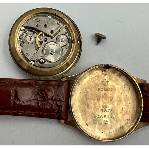 608 - A gentleman's 9ct gold presentation Tudor wristwatch on brown leather strap. Full hallmarks to inner... 