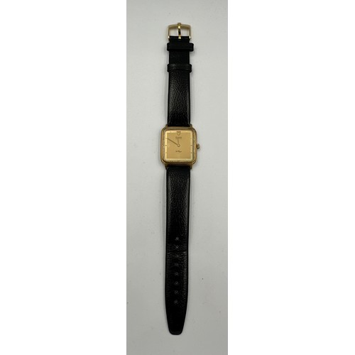 609 - A vintage Tudor Geneve Le Royer gold plated wind up gentleman's wristwatch on black leather strap an... 