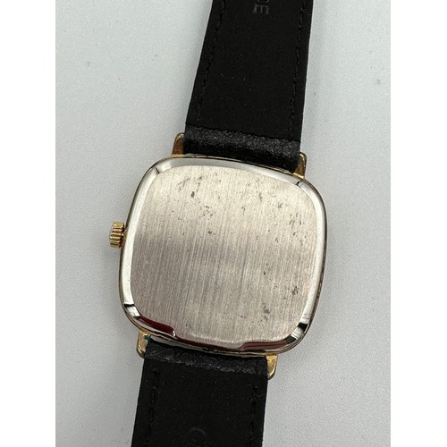 614 - A Tudor gentleman's square shaped wristwatch with gold plate and stainless steel back. 30mm case. In... 