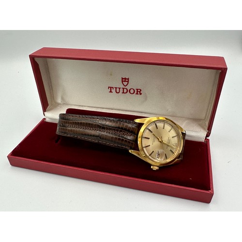 615 - A boxed Tudor Prince Oysterdate gentleman's wristwatch with date aperture on black leather strap. 35... 