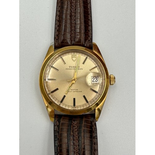 615 - A boxed Tudor Prince Oysterdate gentleman's wristwatch with date aperture on black leather strap. 35... 