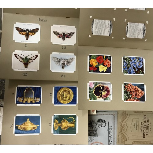 1285 - A collection of complete cigarette card albums to include Butterflies and Moths, The Kings art treas... 