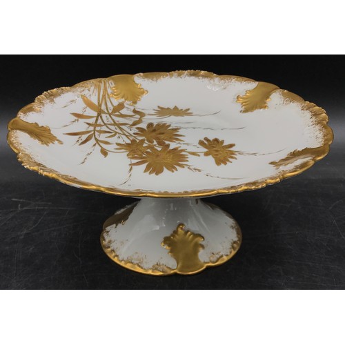 232 - A French white and gold gilt dessert service to include 2x heightened desert plate, cake stand and 6... 