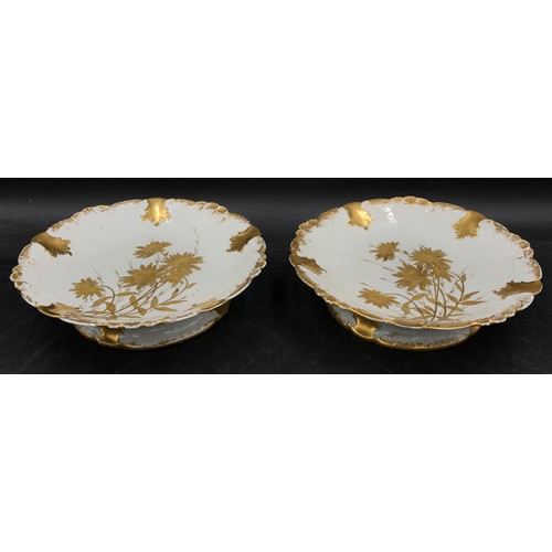 232 - A French white and gold gilt dessert service to include 2x heightened desert plate, cake stand and 6... 