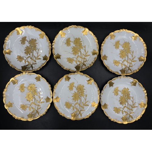 232 - A French white and gold gilt dessert service to include 2x heightened desert plate, cake stand and 6... 