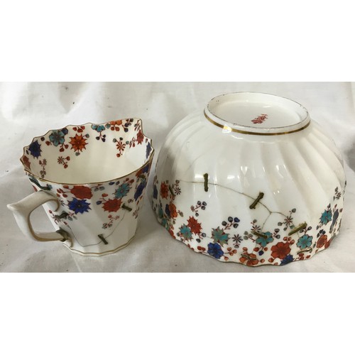 233 - A Royal Crown Derby part tea service decorated in blue and red flowers to include 6x cups, 8x saucer... 