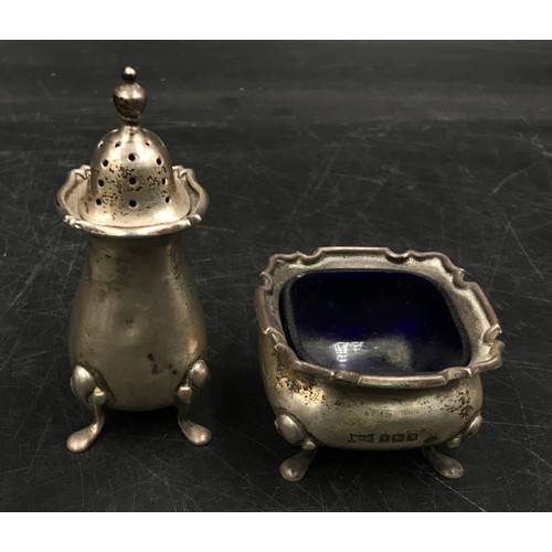 803 - Two weighted silver posy vases one hallmarked London 1906 the other 1907 along with a square mustard... 