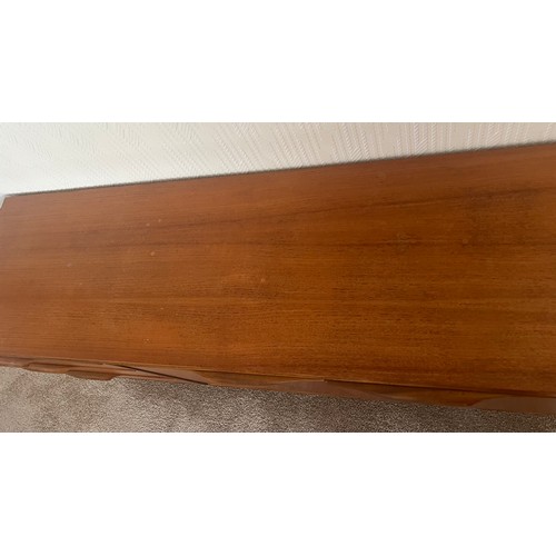58 - A mid century McIntosh sideboard. 201 w x 48 d x 74cm h. Original label to back.