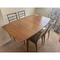 A McIntosh 1960s teak rectangular extending dining table and four dining chairs. 153 w x 91 d x 73cm... 