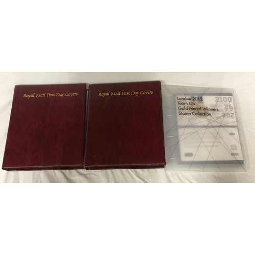 669 - Two royal mail first day cover albums and London 2012 team GB gold medal winners stamp album with ov... 