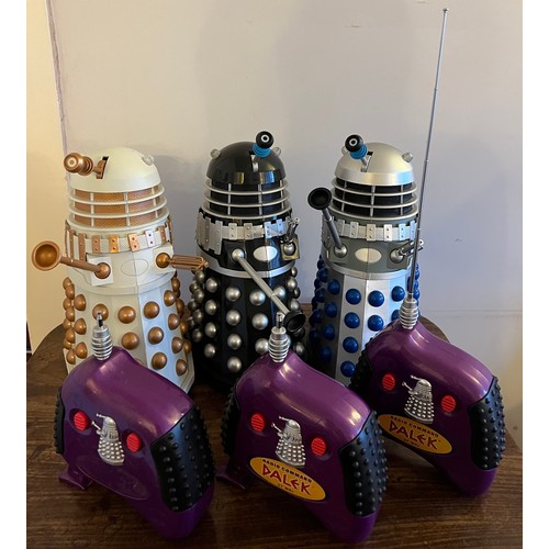 905 - Three product Enterprise battery operated Daleks 31cm h together with three radio commands.