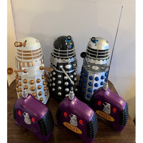 905 - Three product Enterprise battery operated Daleks 31cm h together with three radio commands.