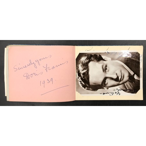 1288 - A small autograph album with signatures from 1930s and 1940s movie stars and entertainment figures, ... 