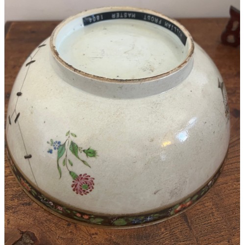 244 - An 18thC porcelain punch bowl 26cm d together with later wooden display stand. Purported to have be ... 