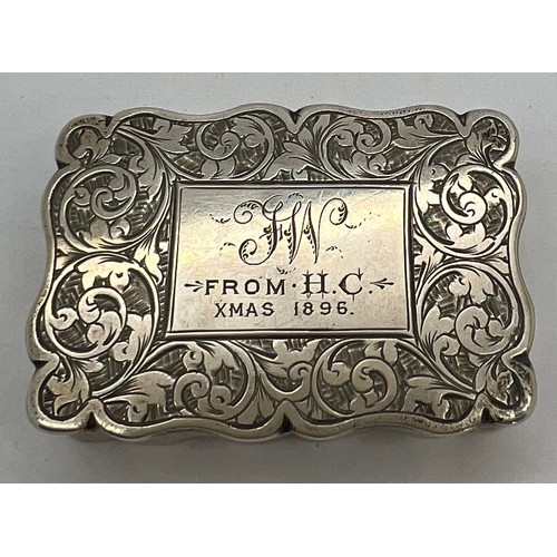 818 - Silver snuff box with foliate scroll engraving and inscription to top. Birmingham 1896, maker Willia... 