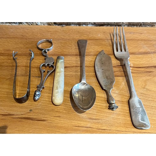 826 - A miscellany of silver including 18thC tea tongs a/f, fork, spoon etc. total weight 140gm.