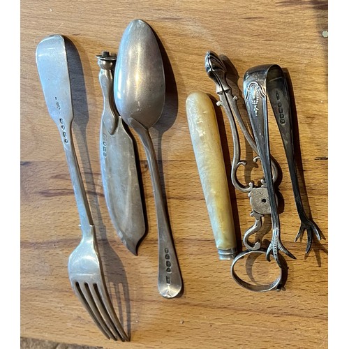 826 - A miscellany of silver including 18thC tea tongs a/f, fork, spoon etc. total weight 140gm.